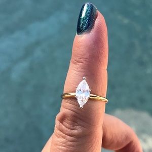 14k yellow gold Marquise cut CZ.